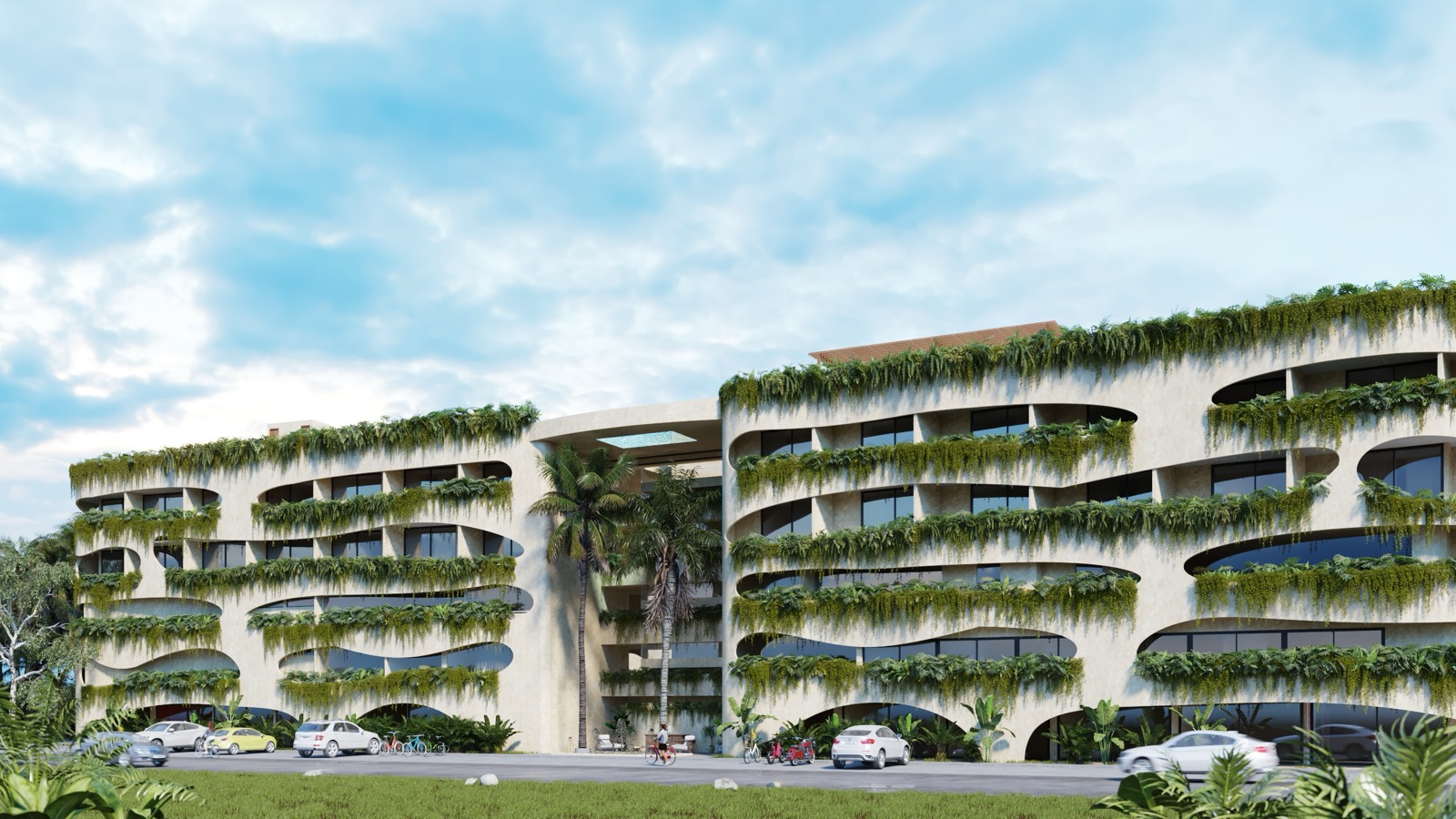 Terreno residencial en Cancun con calle de acceso y palmeras antes de una revision inmobiliaria